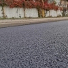 Lucrările de asfaltare avansează pe strada Hatman Luca Arbore