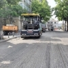 Au început lucrările de asfaltare a carosabilului pe strada I.G. Duca